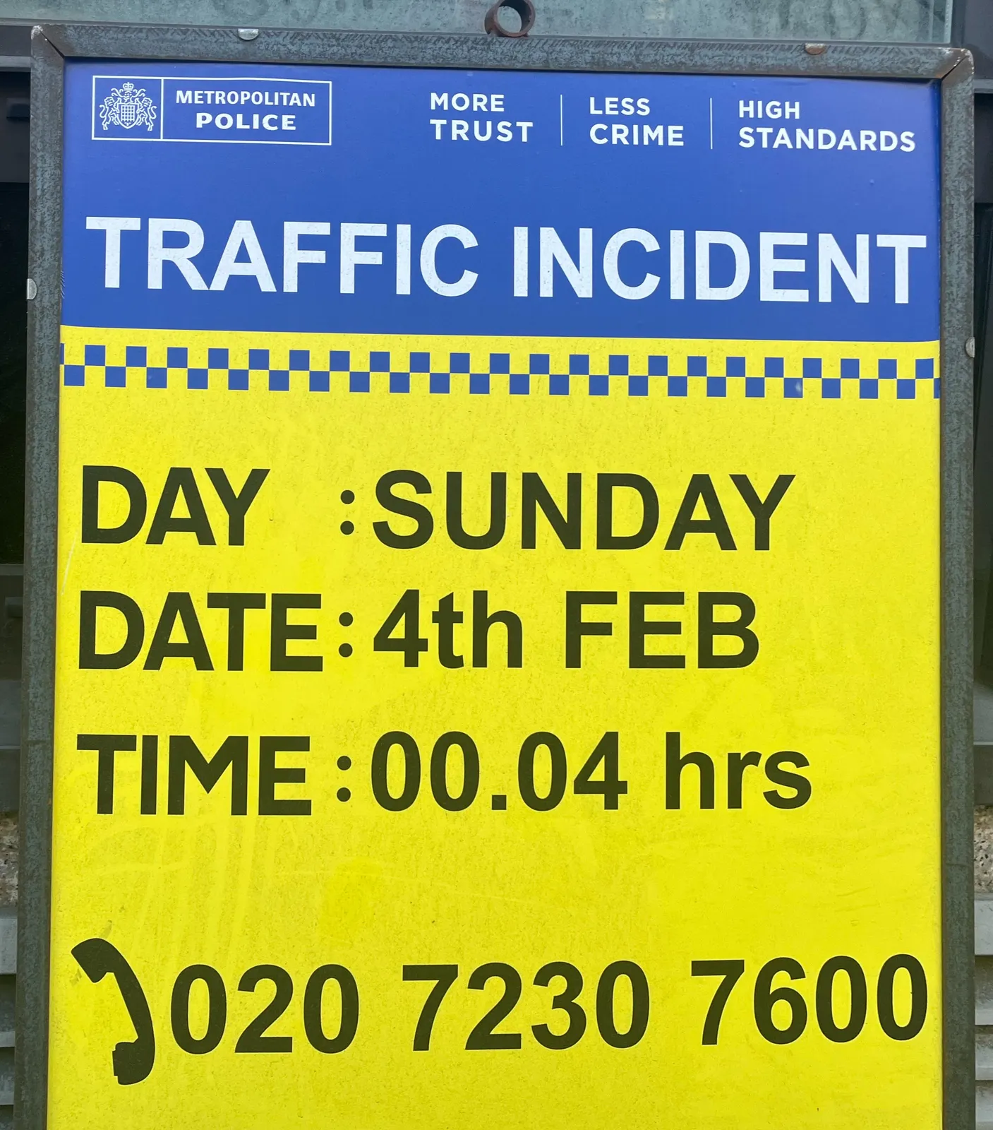 A public poster by the metropolitan police that says: Traffic incident, Day: Sunday, Date: 4th Feb, Time: 00.04 hrs.
