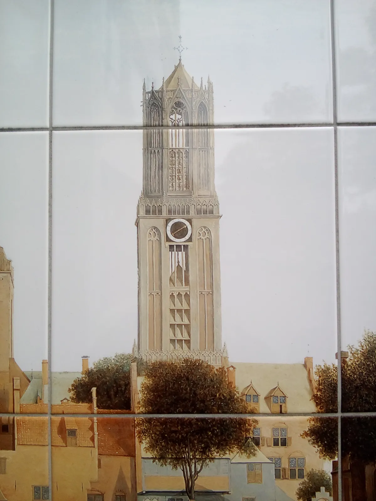 An almost photorealistic print of the enormous Dom cathedral in Utrecht, as it was centuries ago, with a clock with just a single hand on it. This hand points at almost two o’clock.