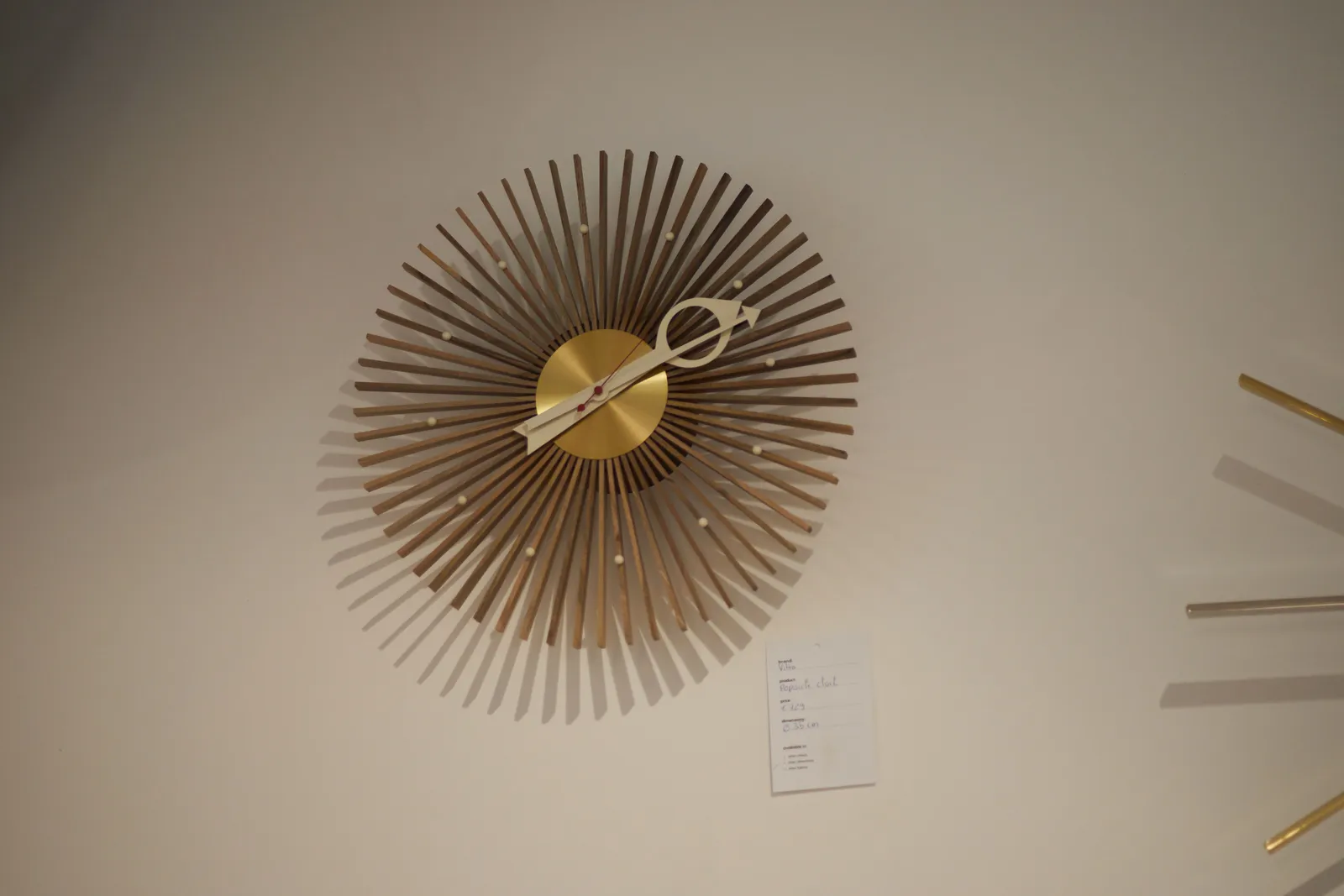 A clock made from sixty sticks points at 11 minutes past two.