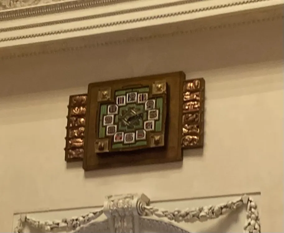If you look closely at the blurry picture of this richly ornamented clock you can see that it is 12 past 2.
