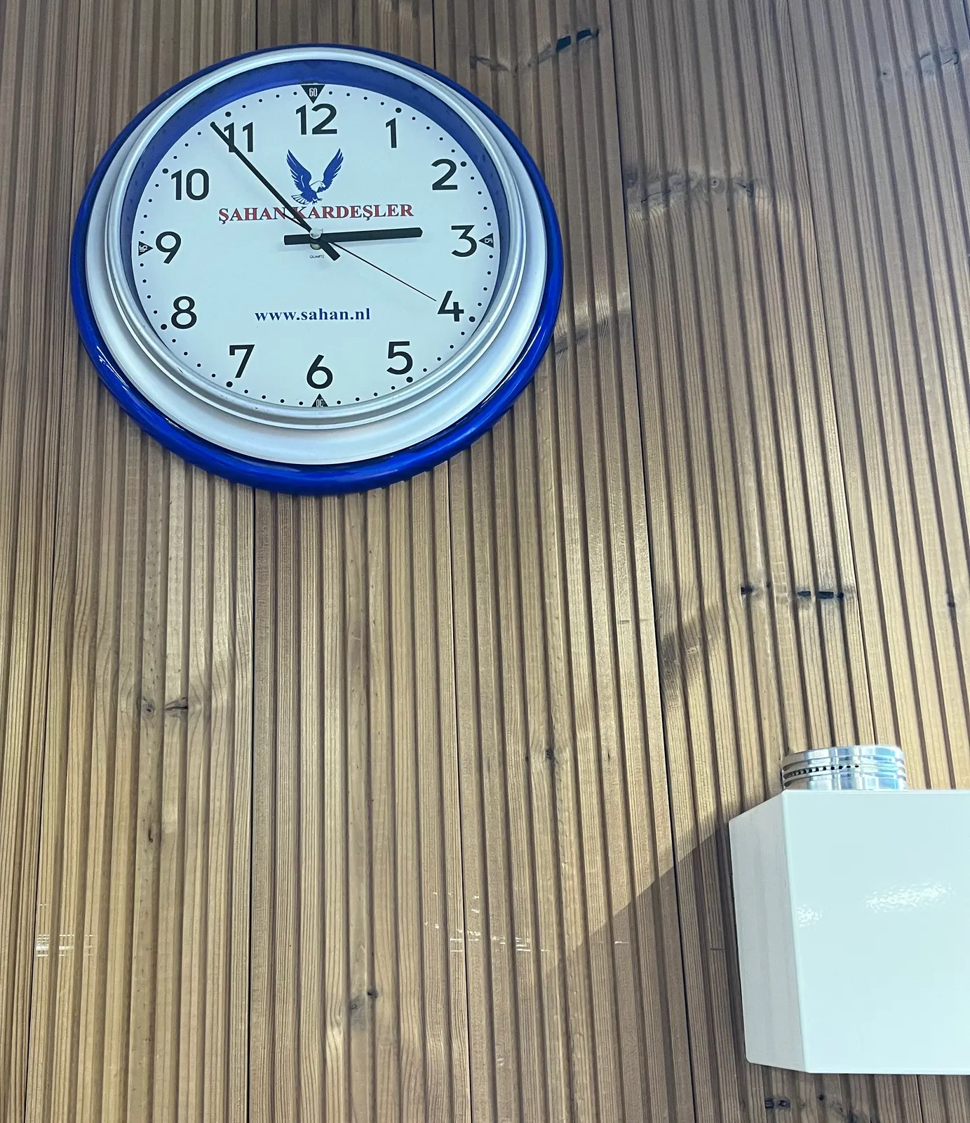 This clock in a Sahan supermarket points at six minutes to three.