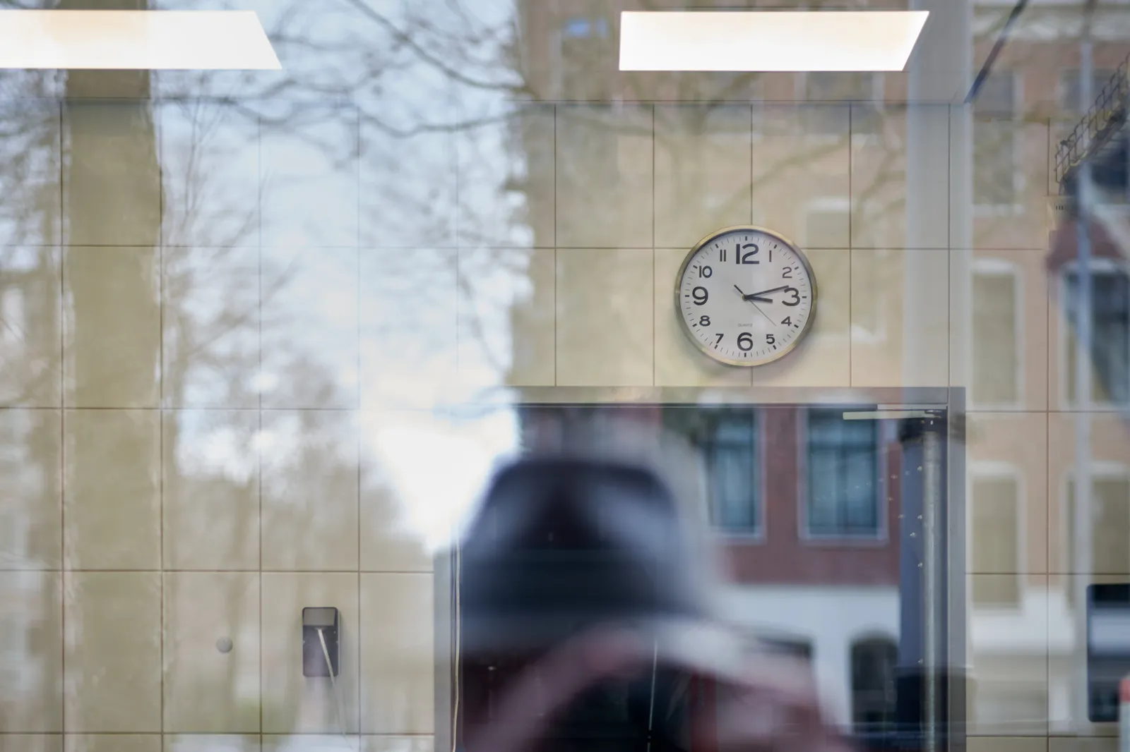According to this clock in a bakery it is 12 past three. 