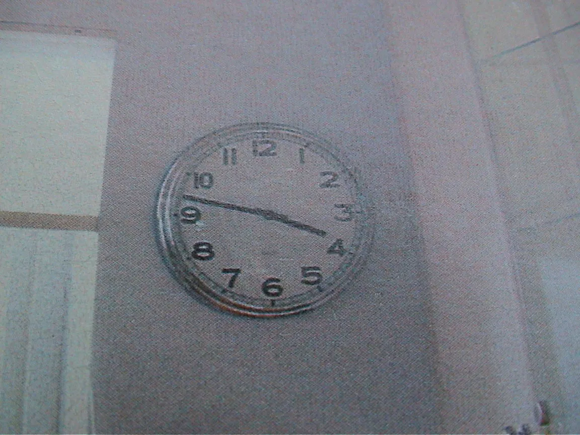 This wall clock says it is 47 minutes past 3.