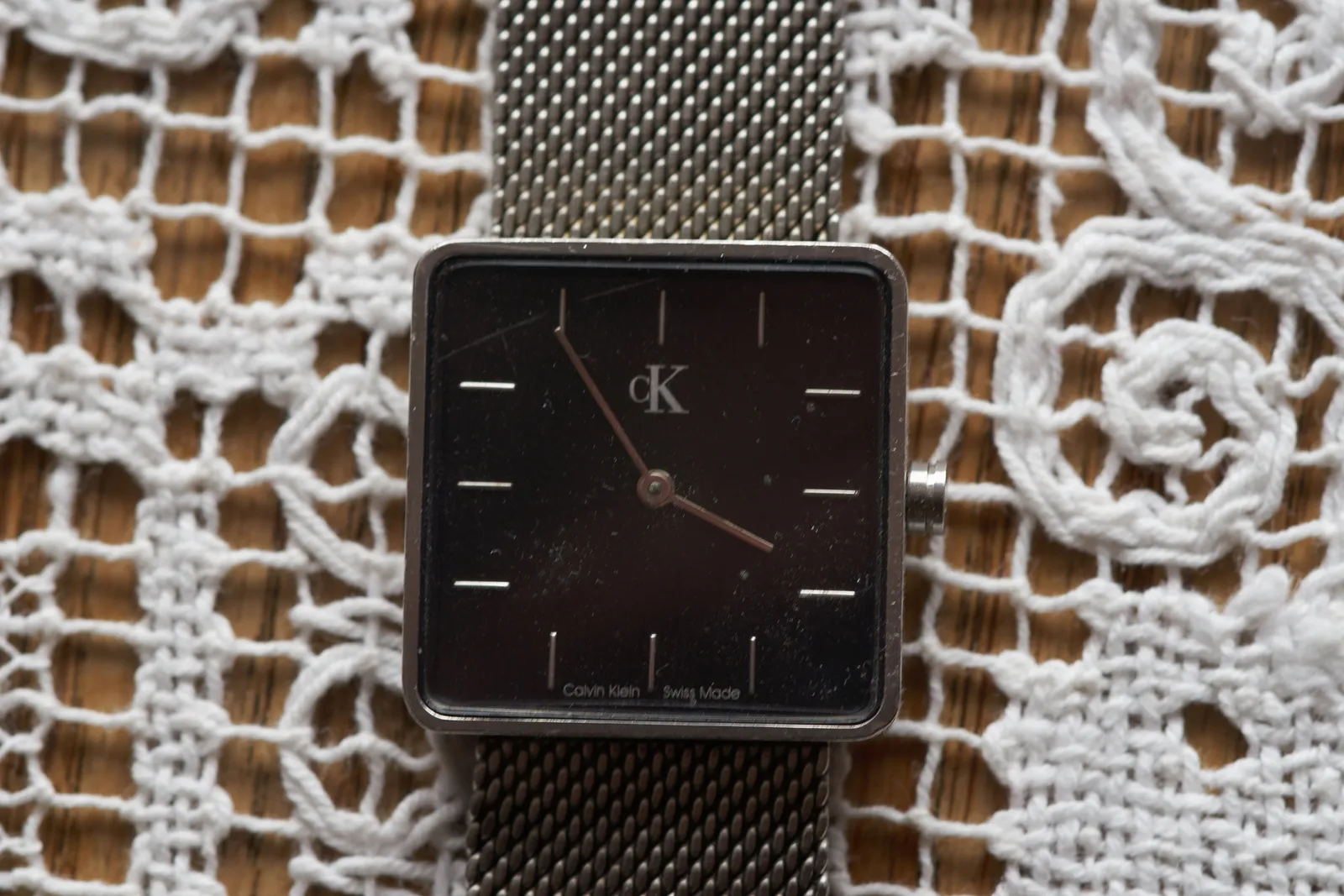 It is approximately 5 minutes to 4 on this geometrically designed watch.