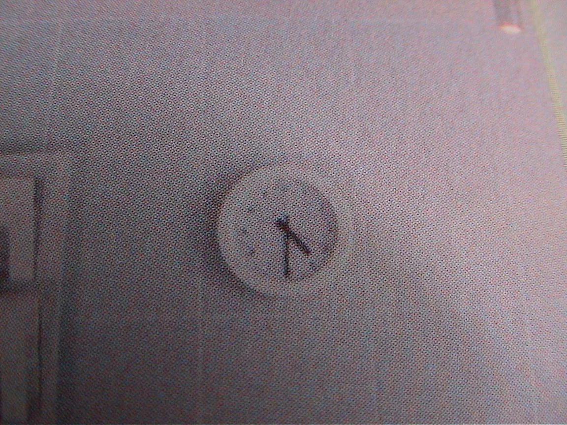 If you look closely, this blurry clock points at half past four.
