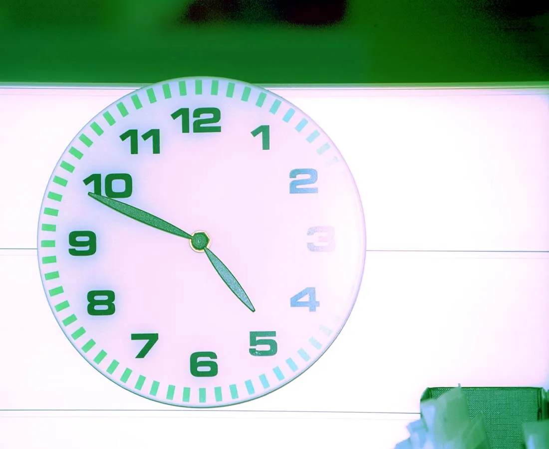 A green clock points at four 49