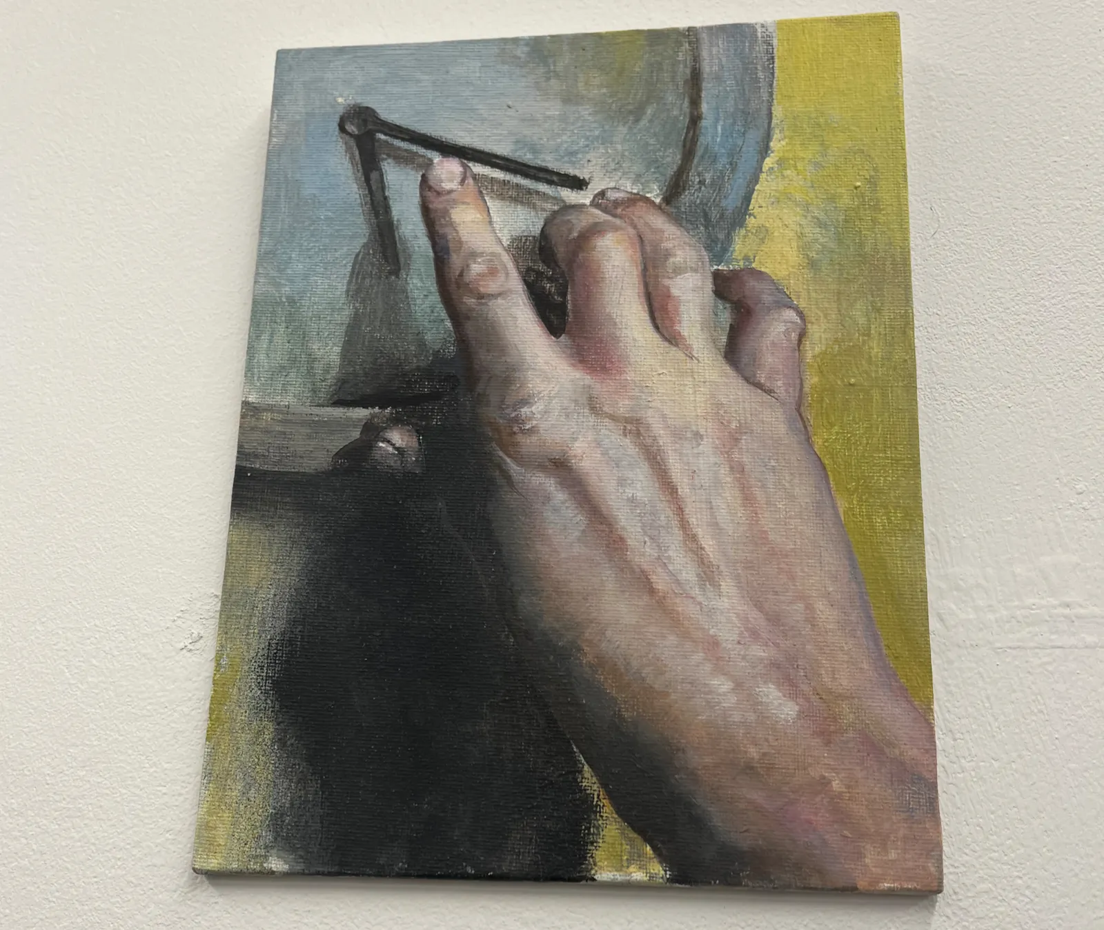 A painting of a hand that touches a clock that points at approximately nineteen past five.