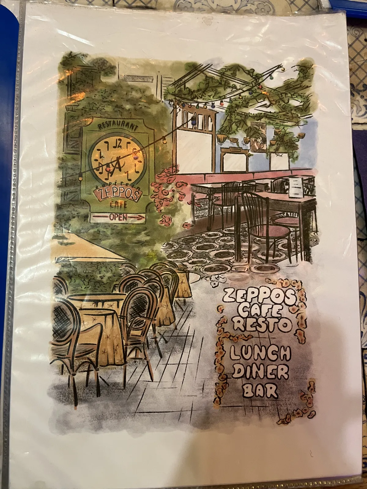 A drawing inside a plastic folder of the facade of Zeppos, café resto. One of the things on this drawing is a clock, which points at 34 minutes past five.