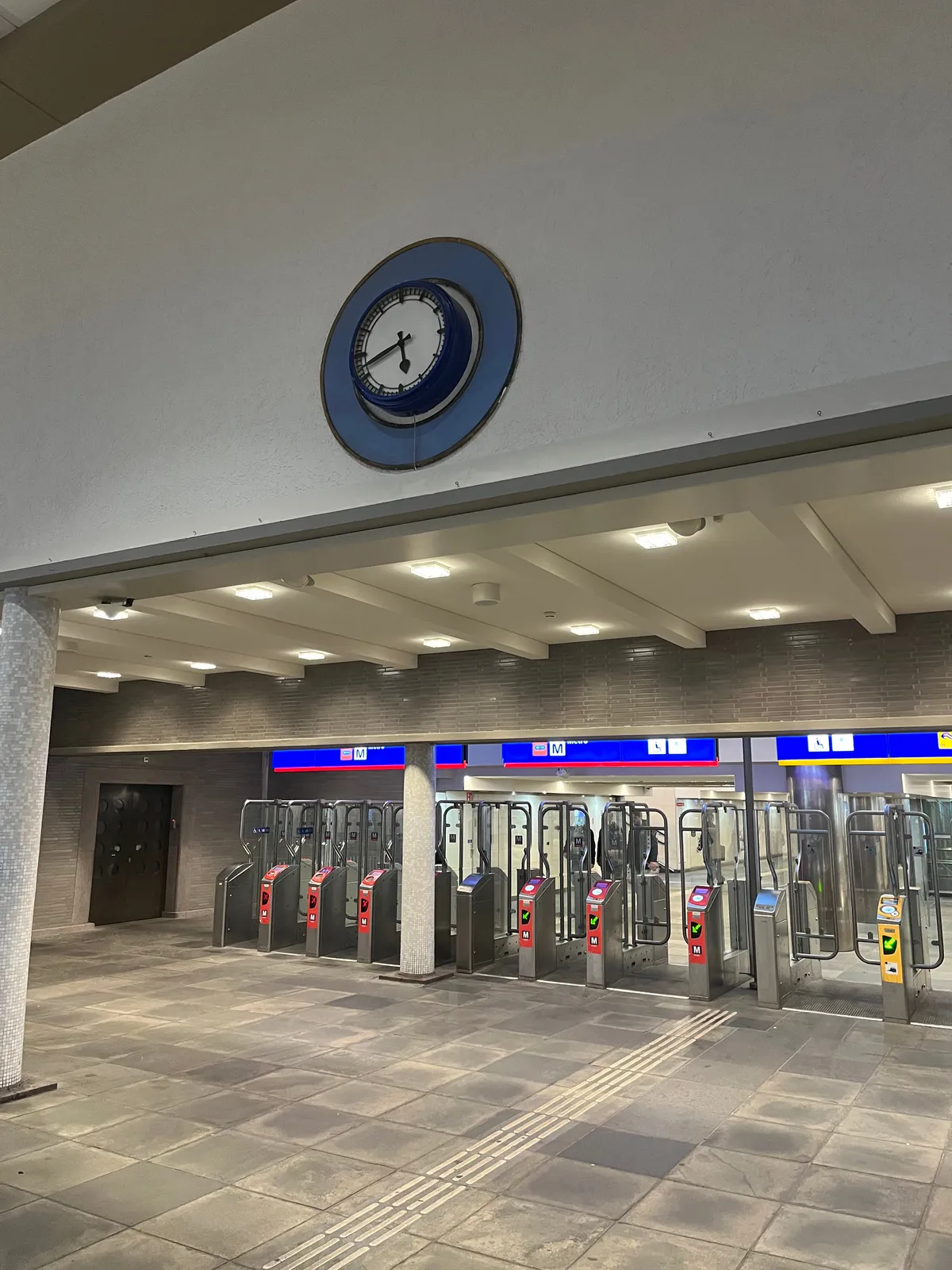 According to this clock inside a station it is 42 past five.