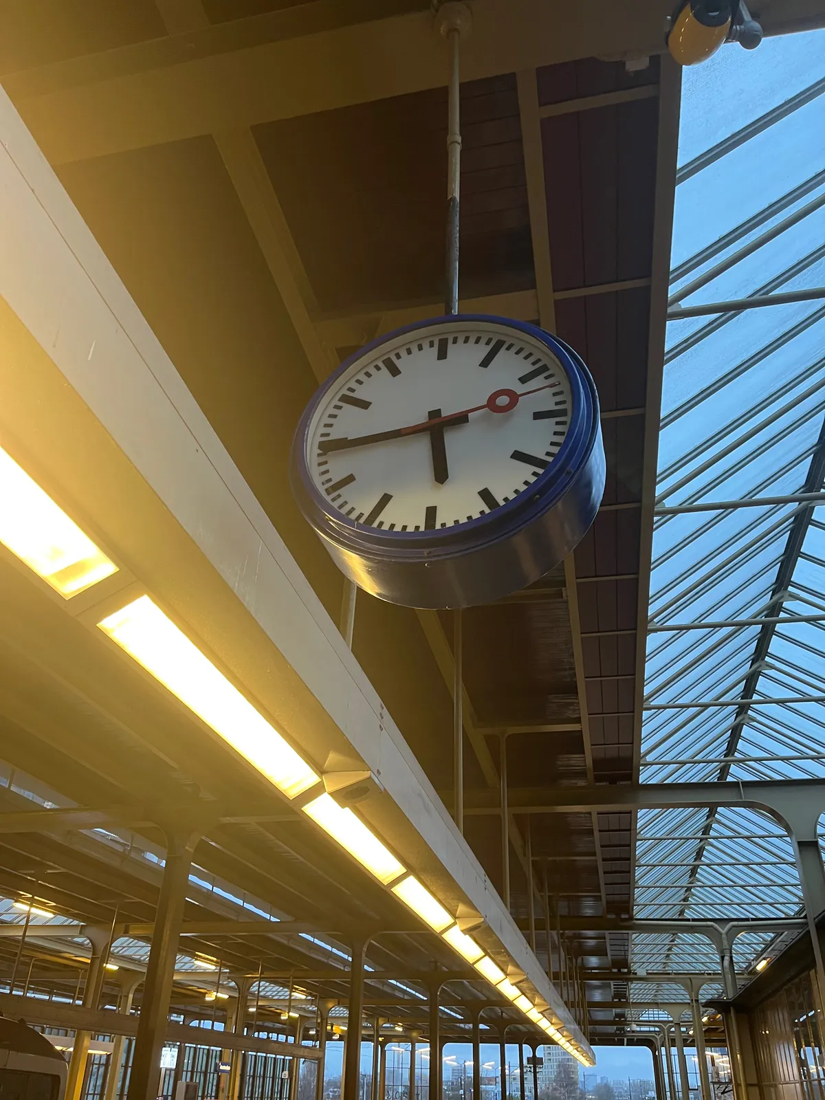 This clock on a train platform points at 5:44.