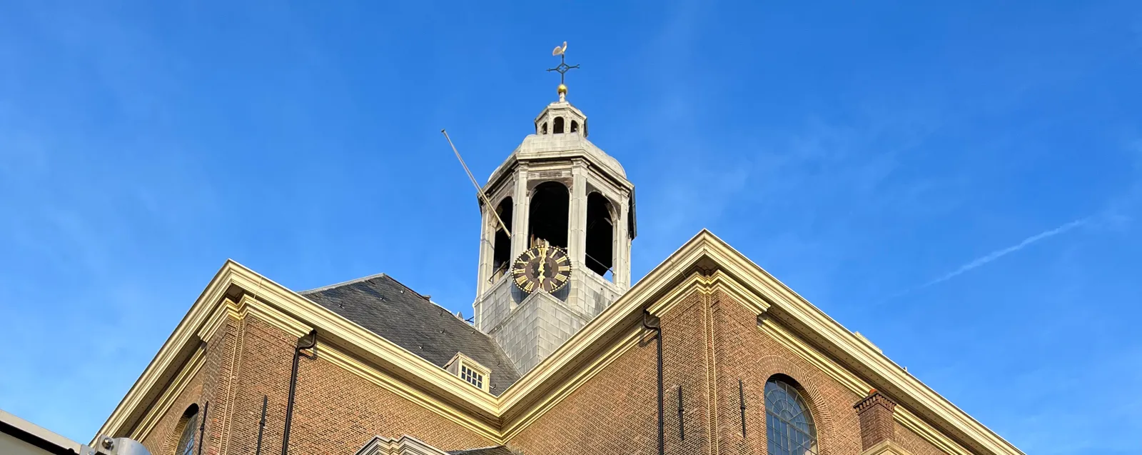 According to this clock on a church tower it is 2 past six.