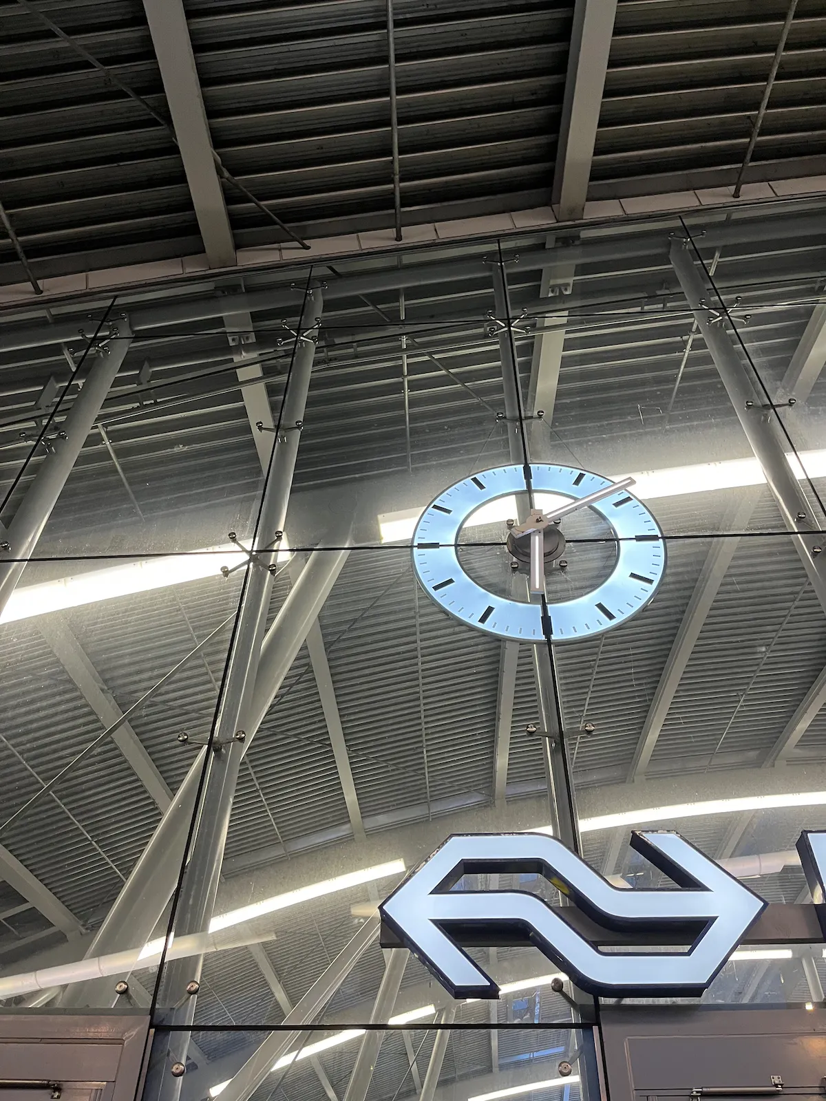 A very large clock seems to point at 8 past six. 
