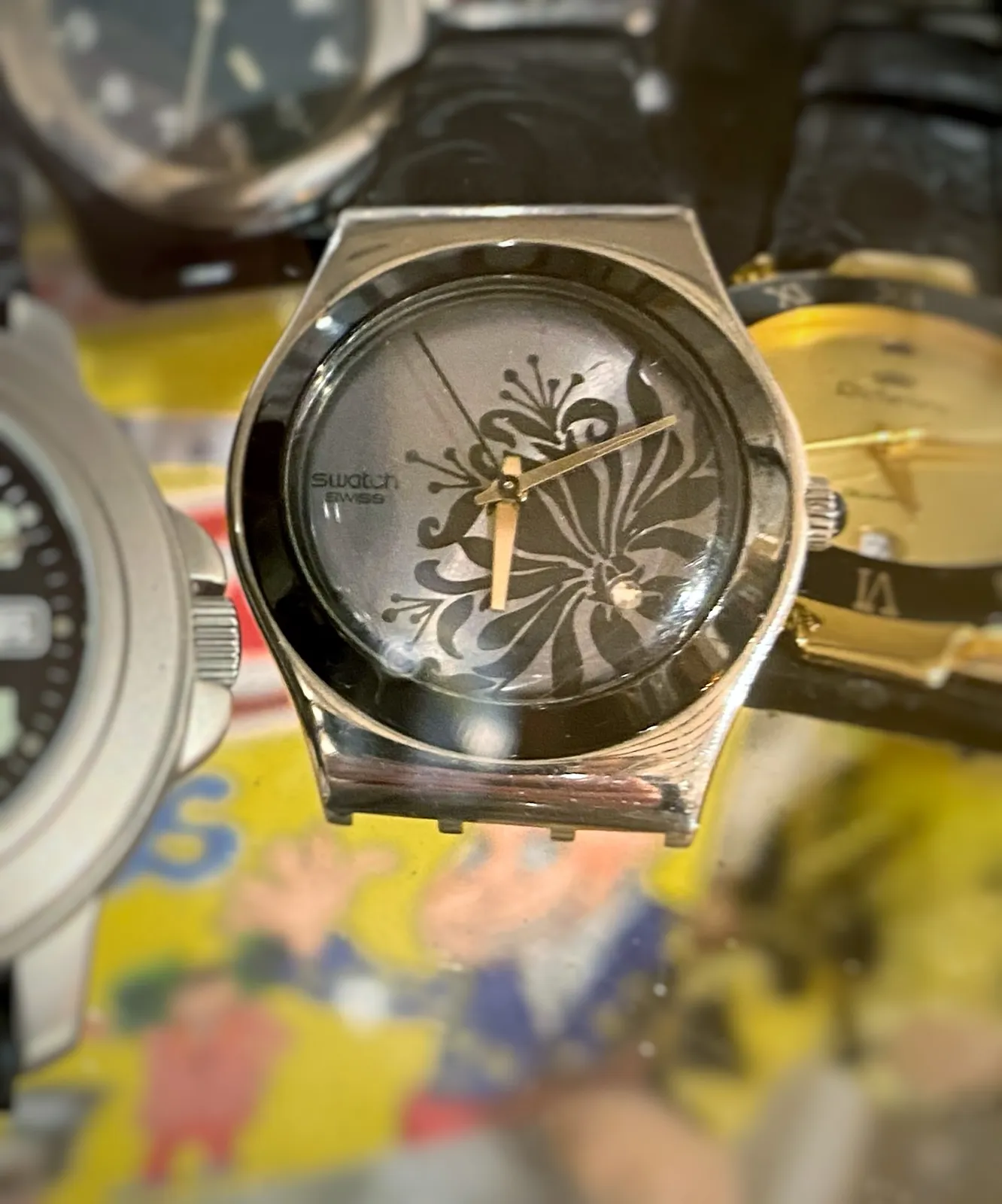 A few different watches for sale. One of them points at 10 past 6, the time can not be read on the others.