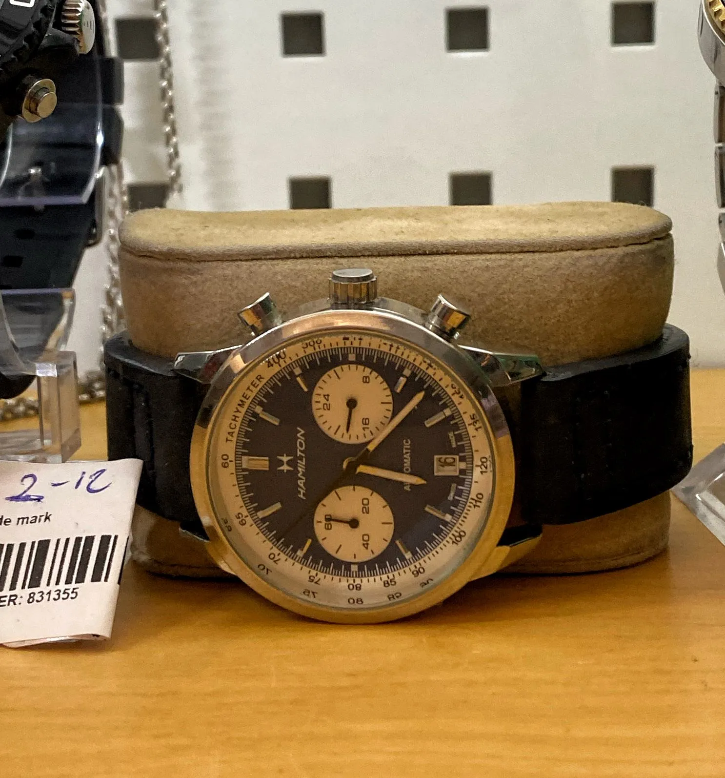 A Hamilton Automatic wrist watch. It points at 22 past 6.