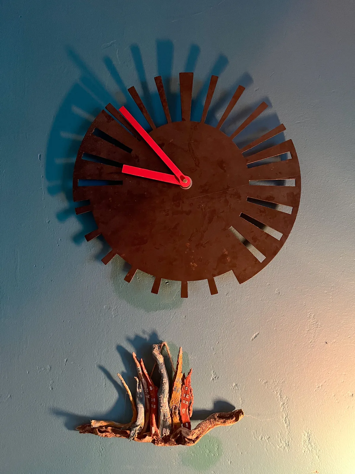 A complex looking clock. Once you figure out it is a 24 hour clock, and not a 12 hour clock, then you will see that it is 7 minutes to 7 in the morning.