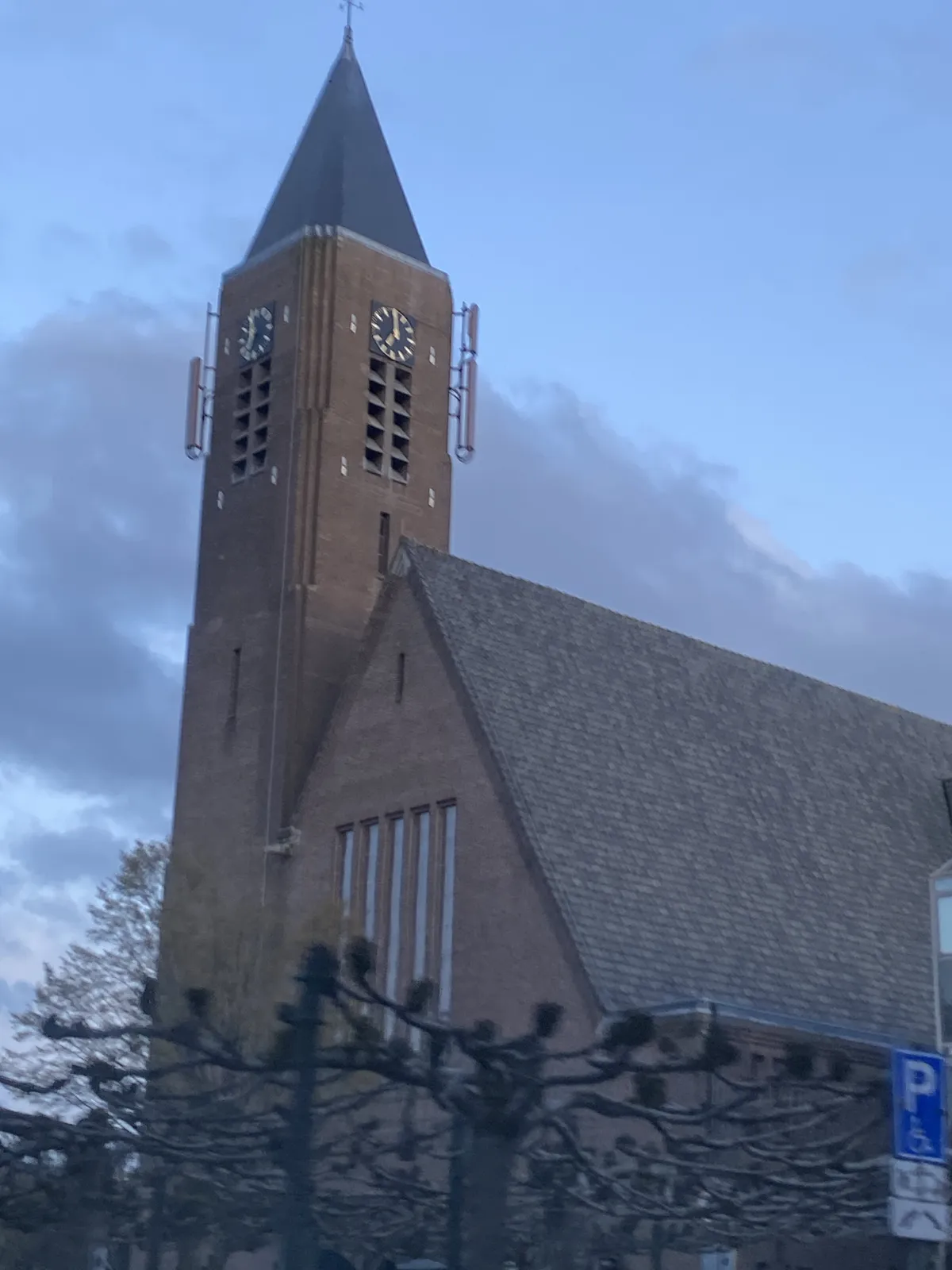 According to the clocks on this church tower it is 7 o’clock.