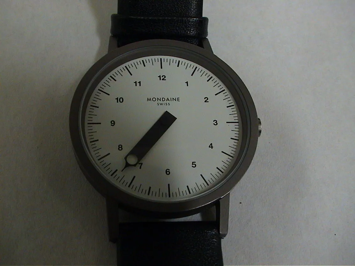 This clock only has one arm. After figuring out how this works you can see that i is 25 past seven.