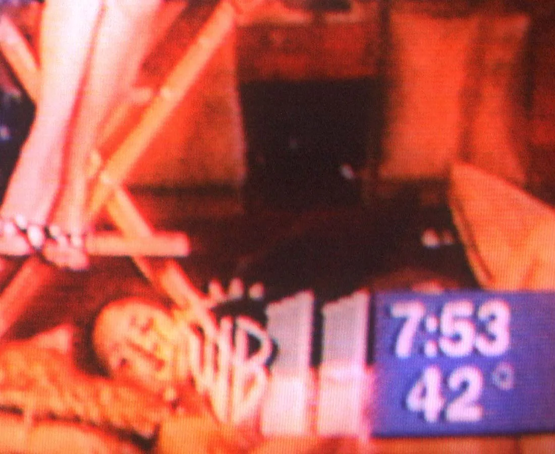 The time in the corner of the TV says it is 7:53
