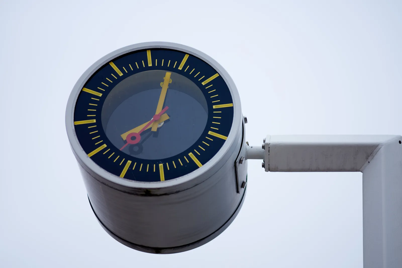 This clock points at three minutes past eight. 