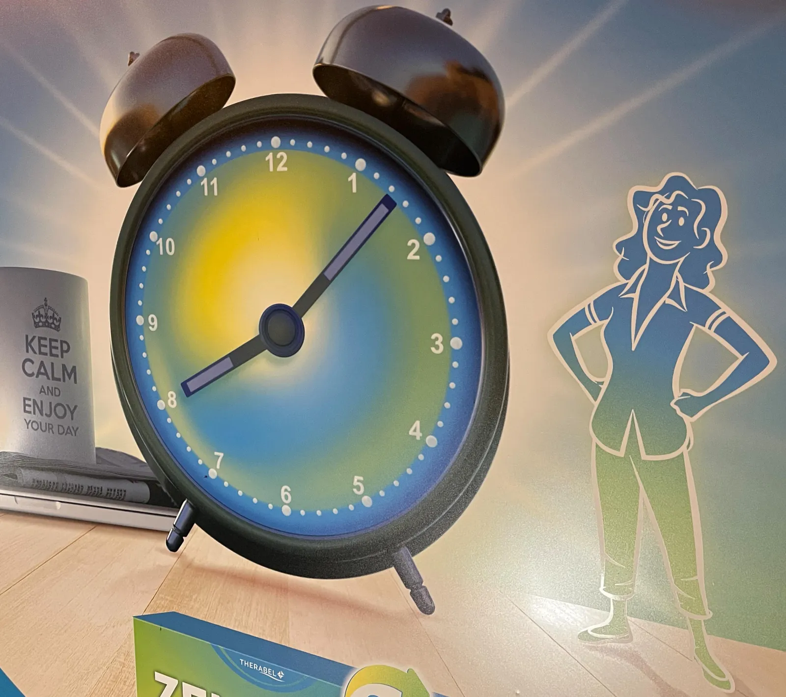 On this printed advertisement there’s a clock that points at 7 past 8.