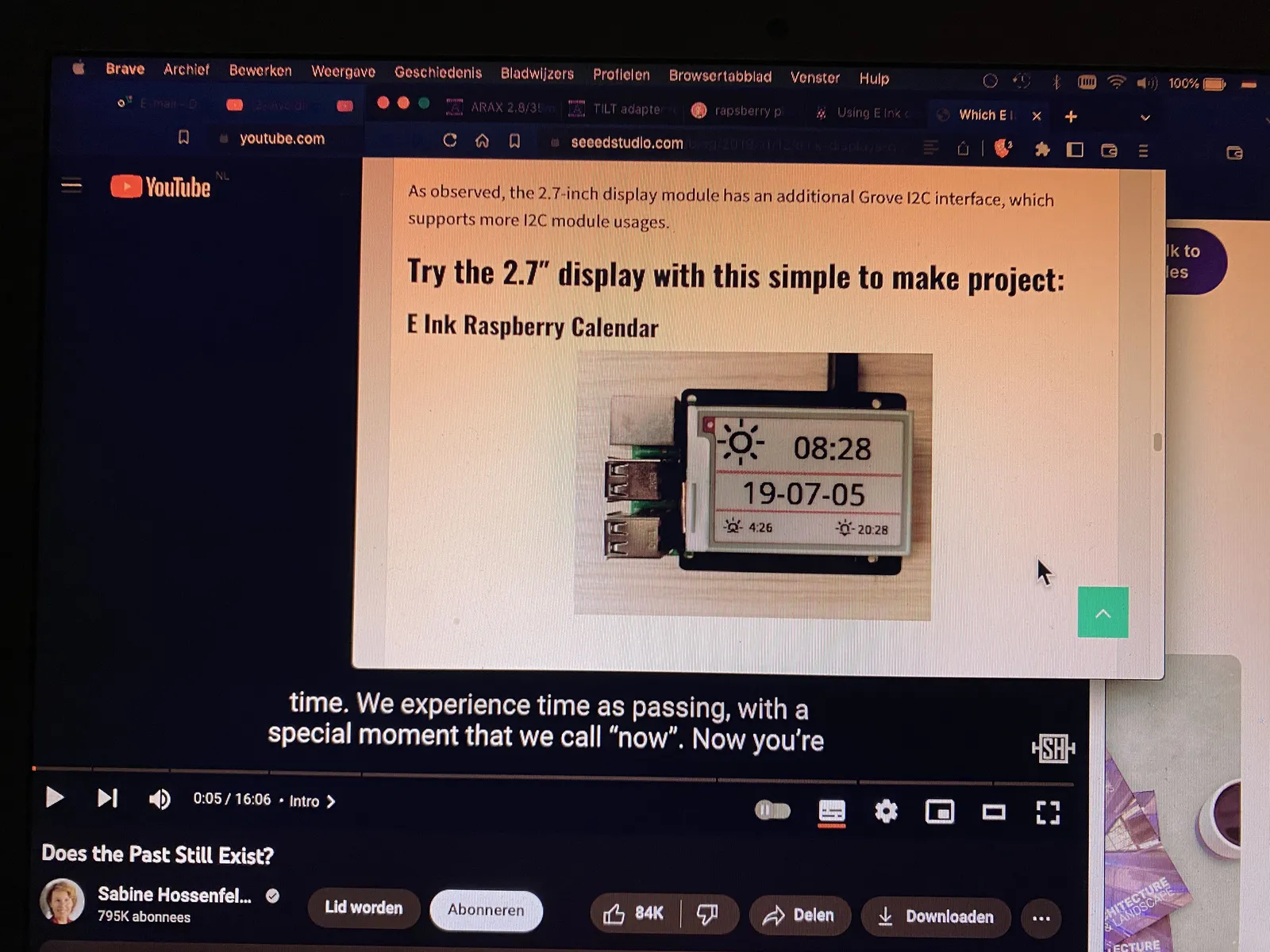 A screenshot of a computer. In the middle is an image of a raspberry pi with an e-paper screen on it. It shows the time as 08:28.