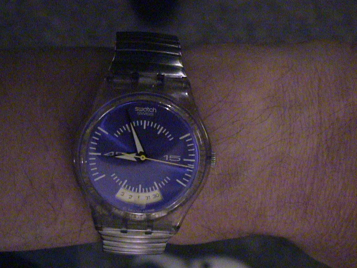 On this purple watch it is four minutes to nine.