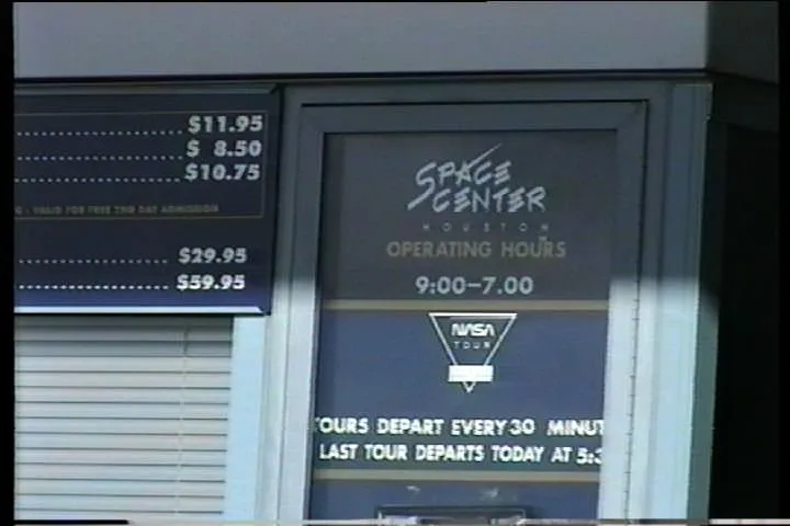 A display says that the Space Center is open from nine — which it is now — till seven.