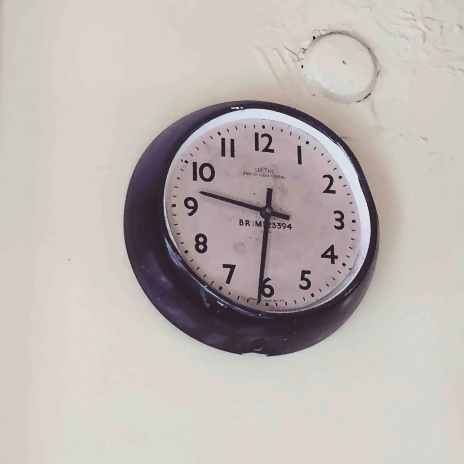 This wall clock points at 31 past nine.
