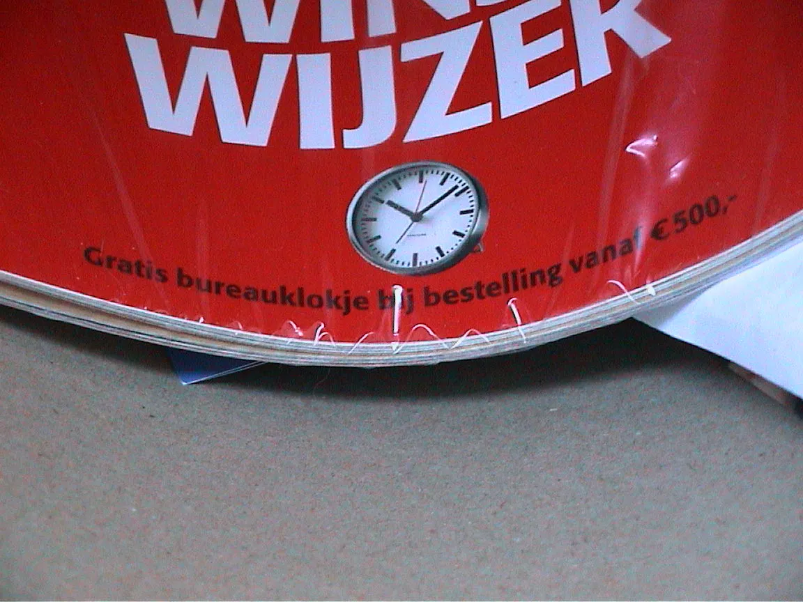 It is 8 past 10 on the clock on this advertisement.