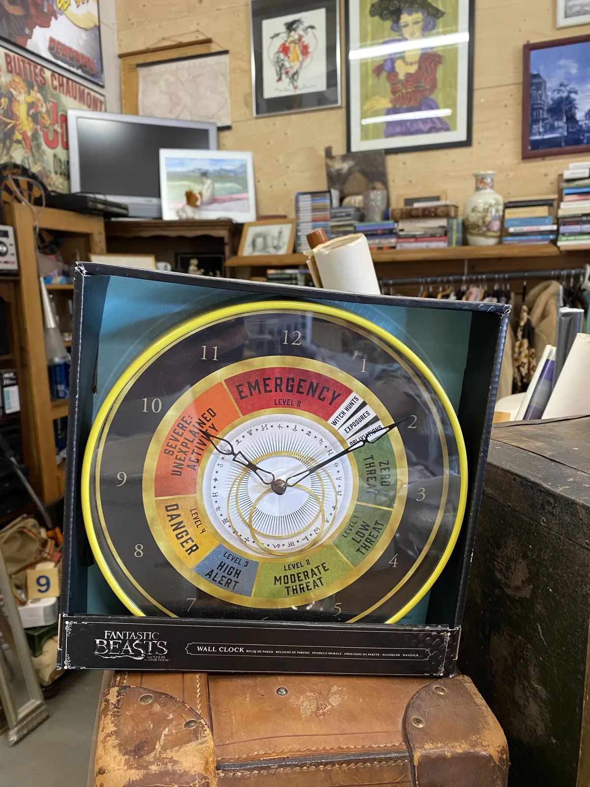 In a thrift shop there’s a clock, still wrapped in plastic. If you look at the words and colours on the face you would think that it is some kind of emergency indicator. But it isn’t. It’s a clock. And it points at 9 past 10.