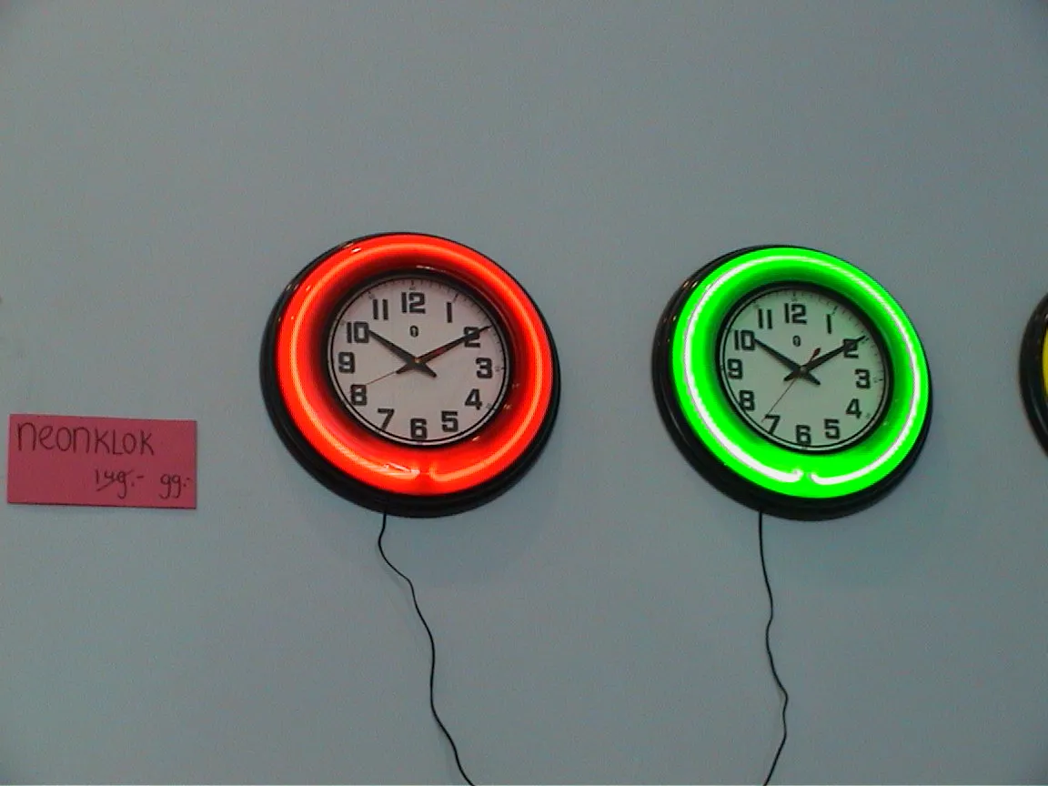 It is ten past ten on both these neon clocks.