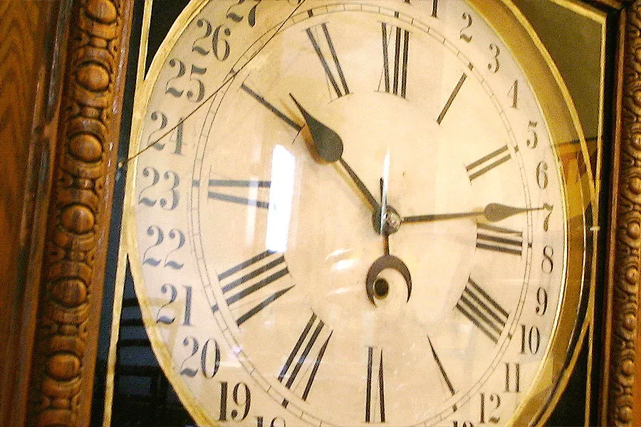 It is 10:13 on this old clock (with a crack in the class cover)