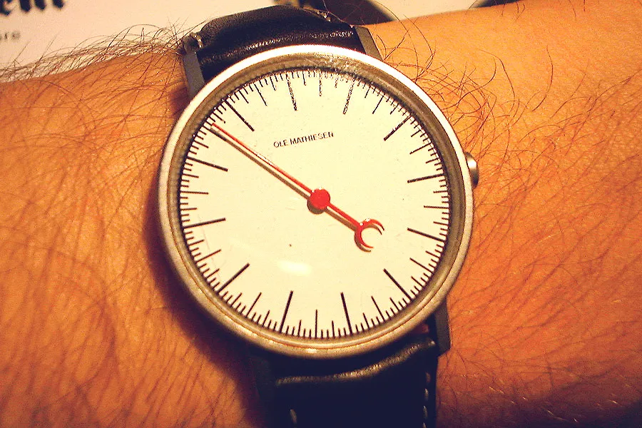Once you figure out how this watch with just one arm works, you’ll know that it is 36 past ten.