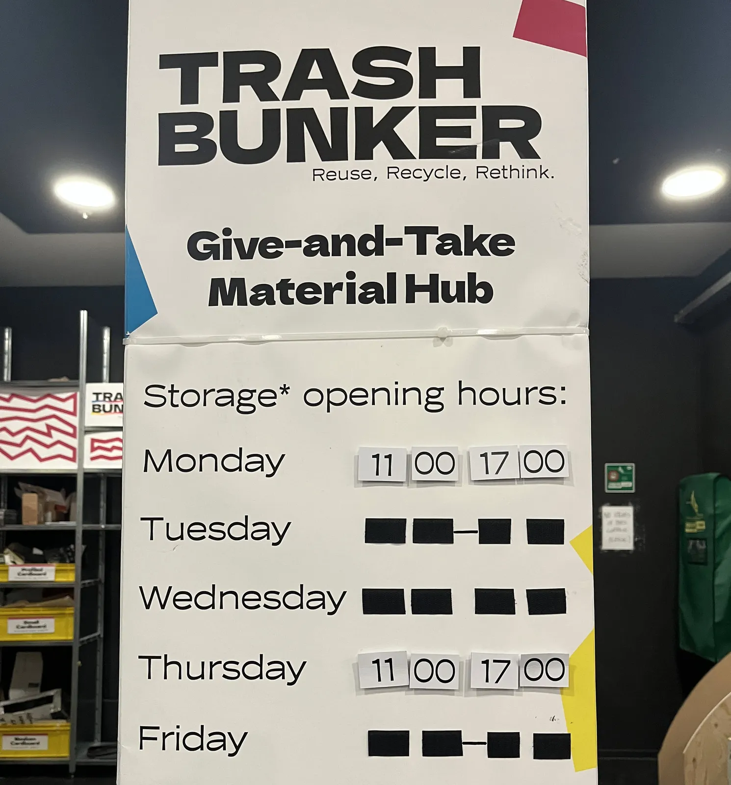 A poster promoting a Trash Bunker, a Give-and-Take material hub. The opening hours are printed on the poster as well. The timestamps in the opening hours are 11:00 and 17:00.
