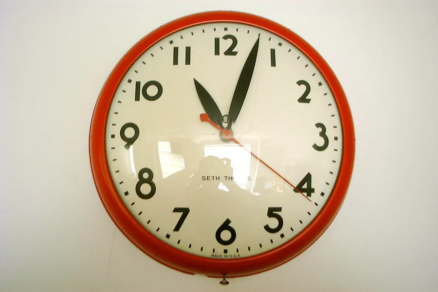 It is 11:03 on this wall clock.