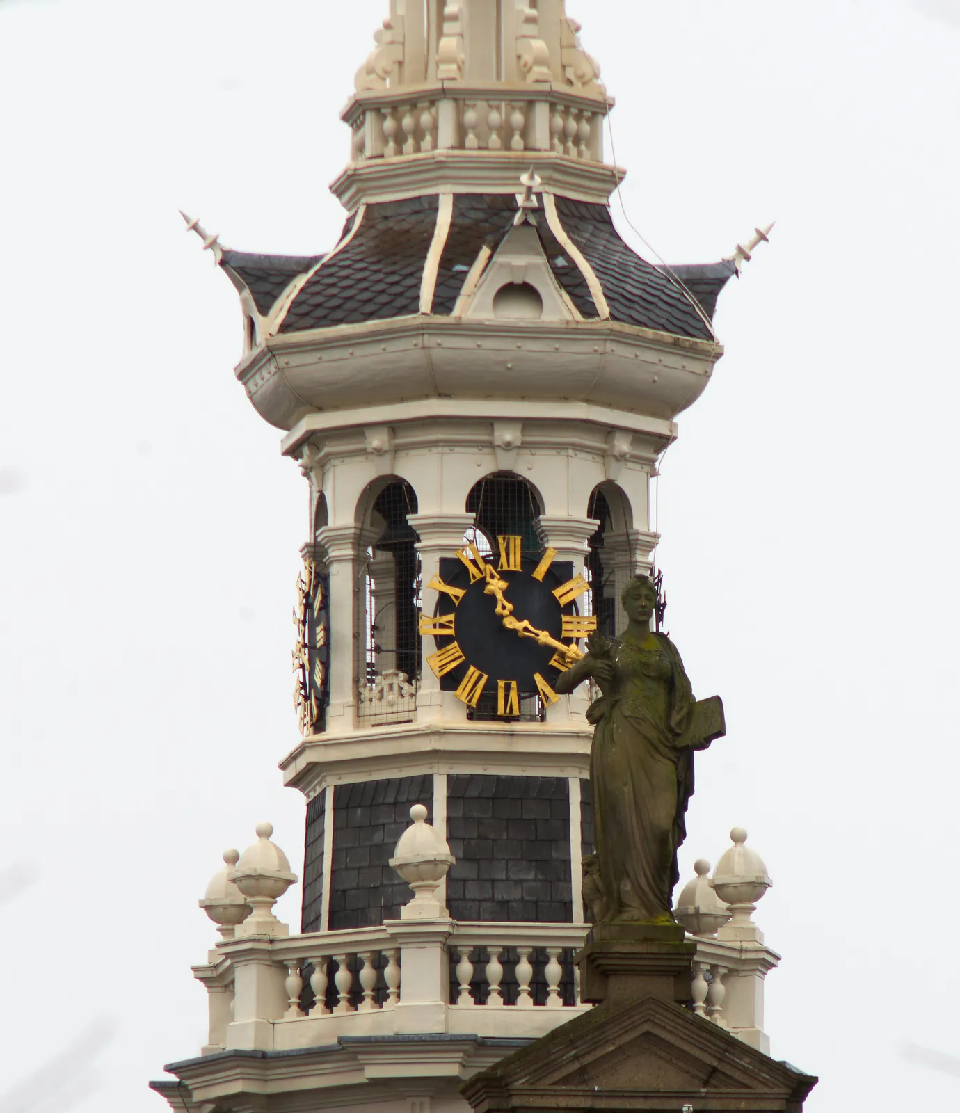 This clock on an old church tower points at 19 past 11.