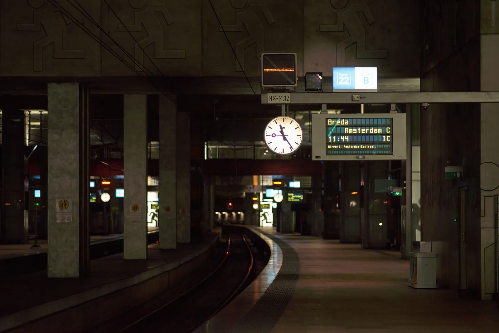 A clock in one of the tunnels of Antwerp Central station points at 24 past 11. In 20 minutes the train to Amsterdam will leave.