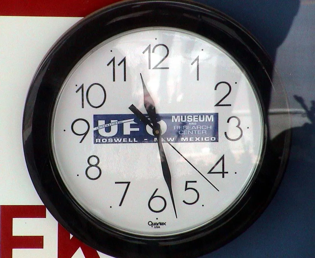 On this clock it says UFO Museum and Research Center, Rosswell New Mexico. It points at 11:28