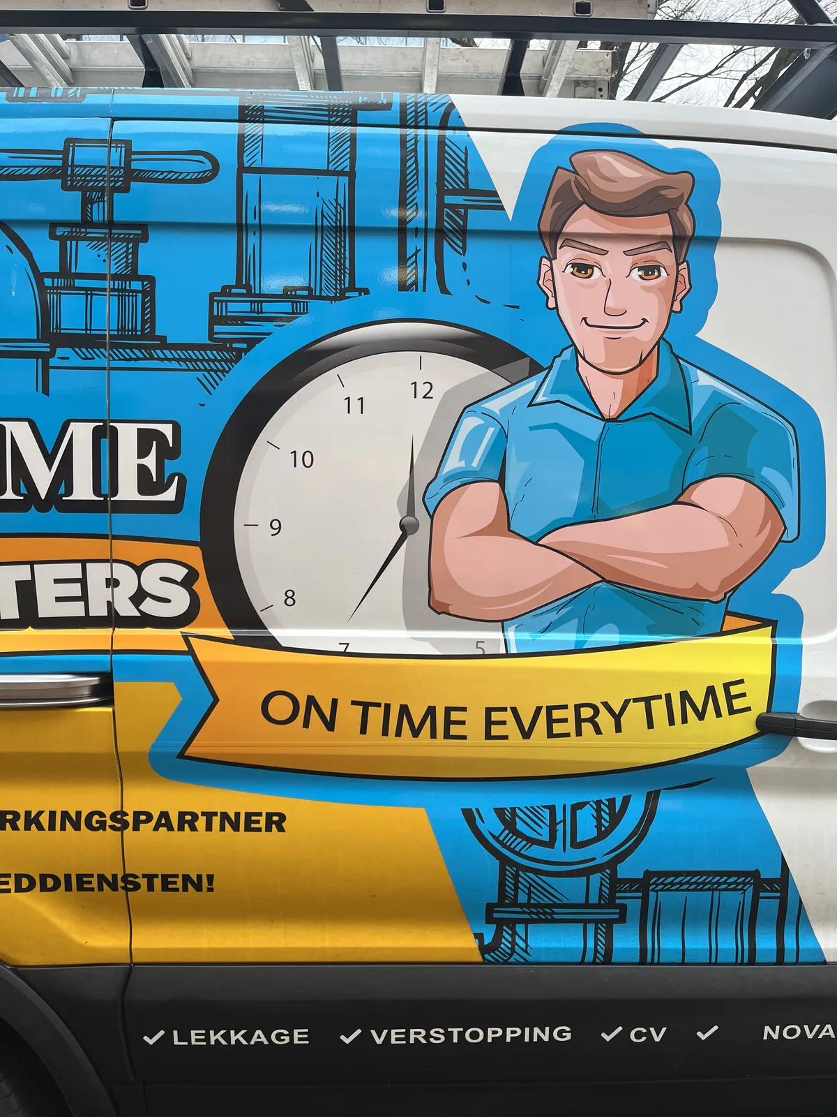 A drawing of a smiling person on a van, with the slogan, in a banner, On time everytime. Behind the person there’s a drawing of a clock which points at approximately 35 minutes past eleven.