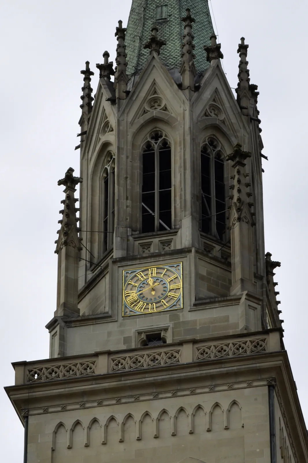 The clock on the tower of the St.-Laurenzen church in St.-Gallen says it is 11:40