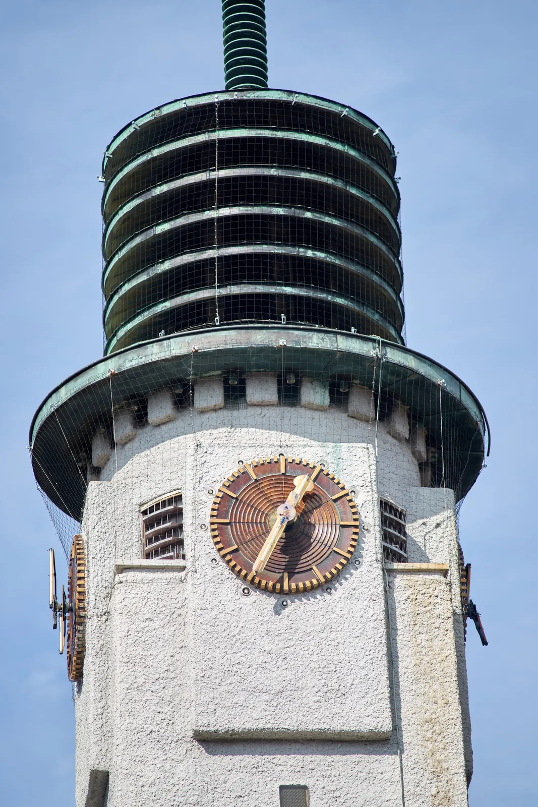 On an building in Betondorp in Amsterdam there’s a tower with clocks. The one that faces us points at 26 to one.