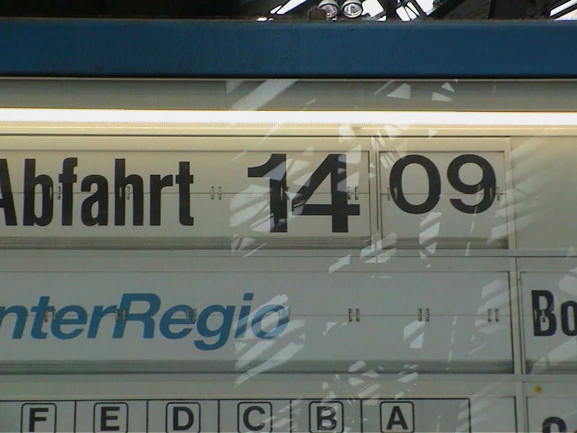 According to this sign, the train departs at 14:09