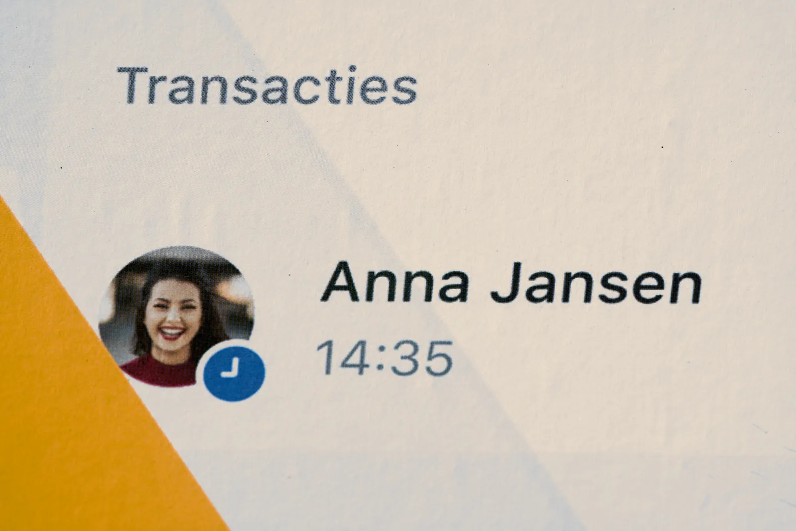 A detail of a billboard advertisement. It says Transactions. And then next to the face of a happy woman, and below what seems to be her name — but Anna Jansen is such a common name in the Netherlands, it could be true, but I doubt it — there’s a timestamp printed. It says 14:35.