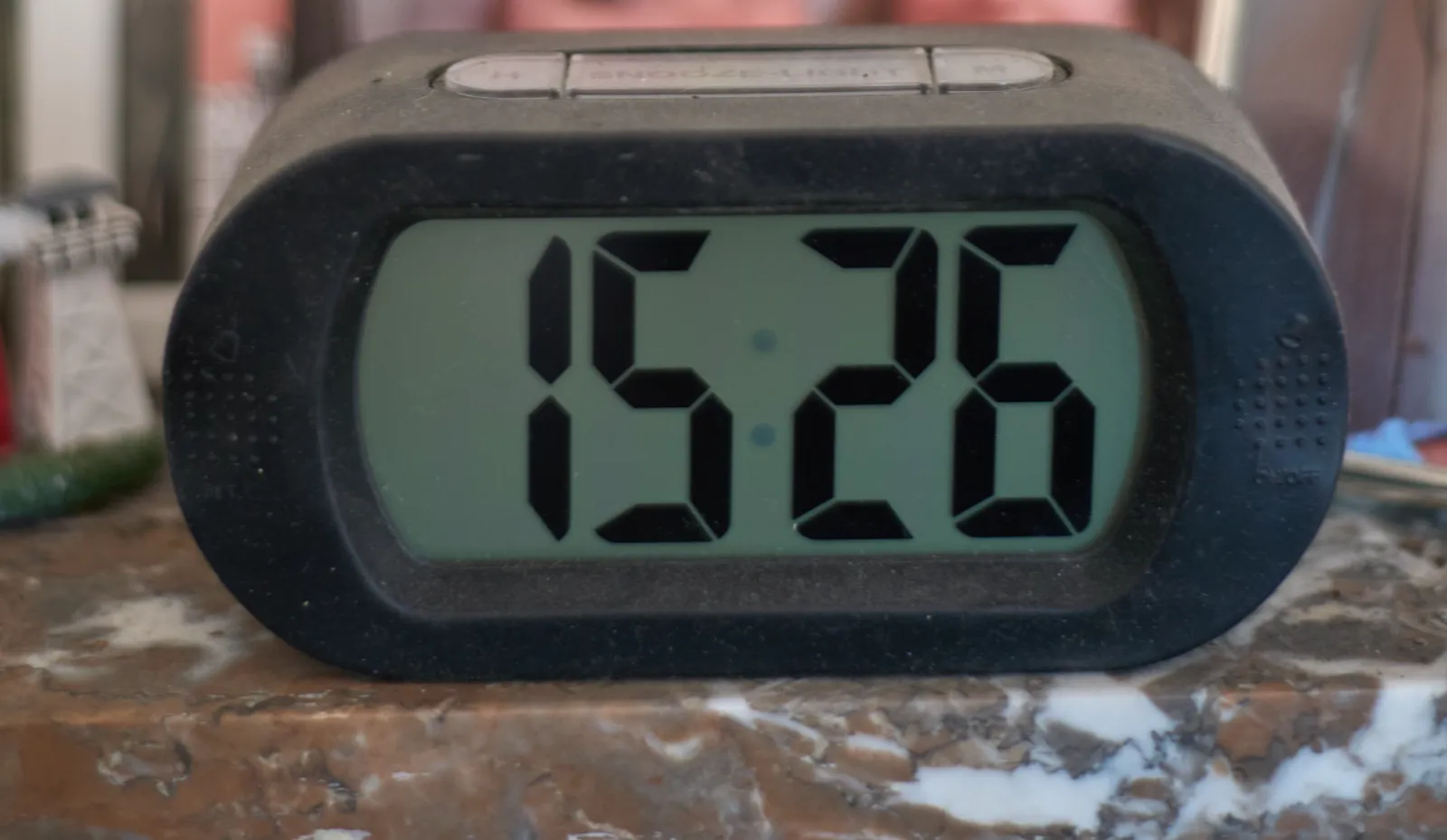 A digital display that says the time is 15:26