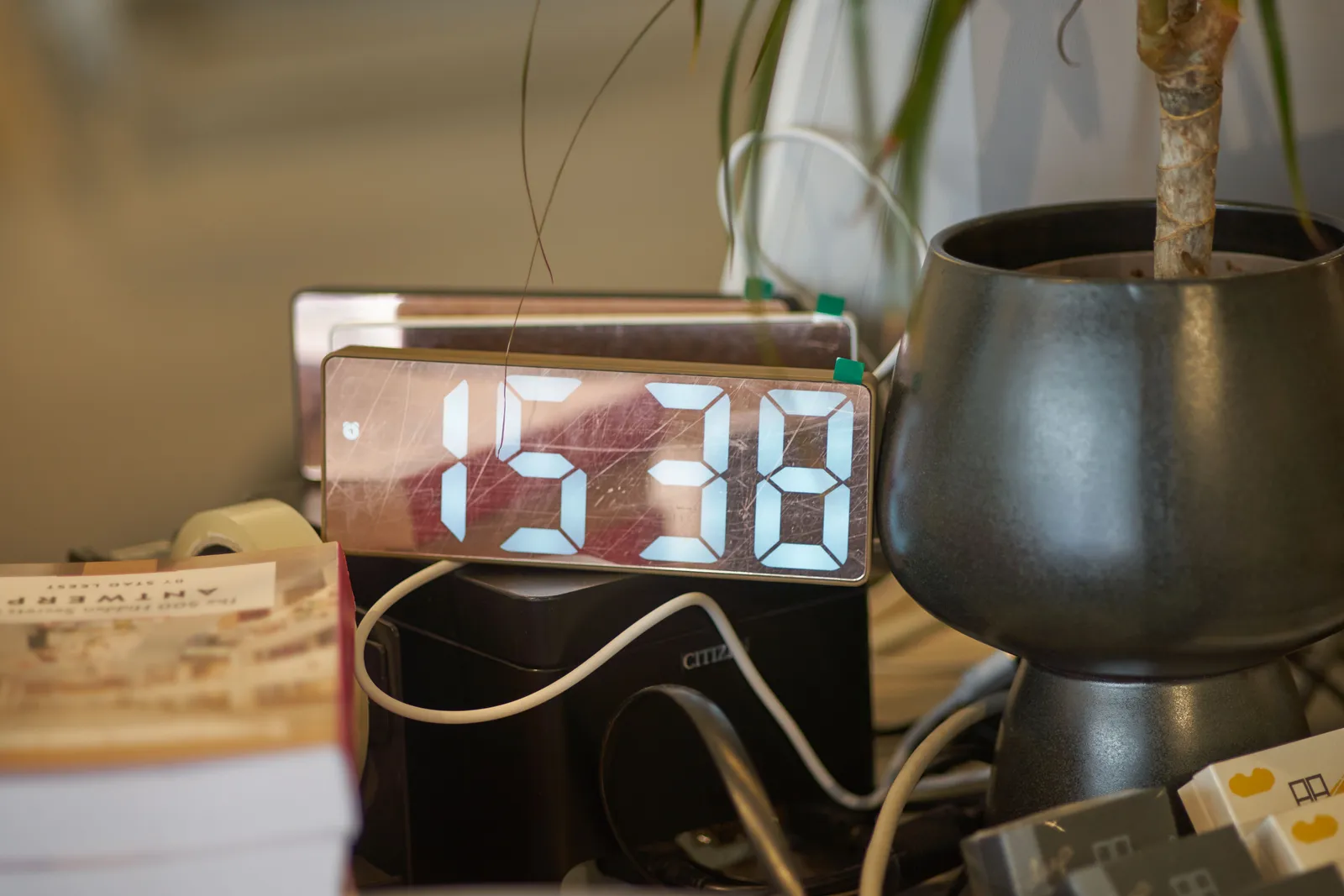 According to this digital clock on a counter it is 15:38.