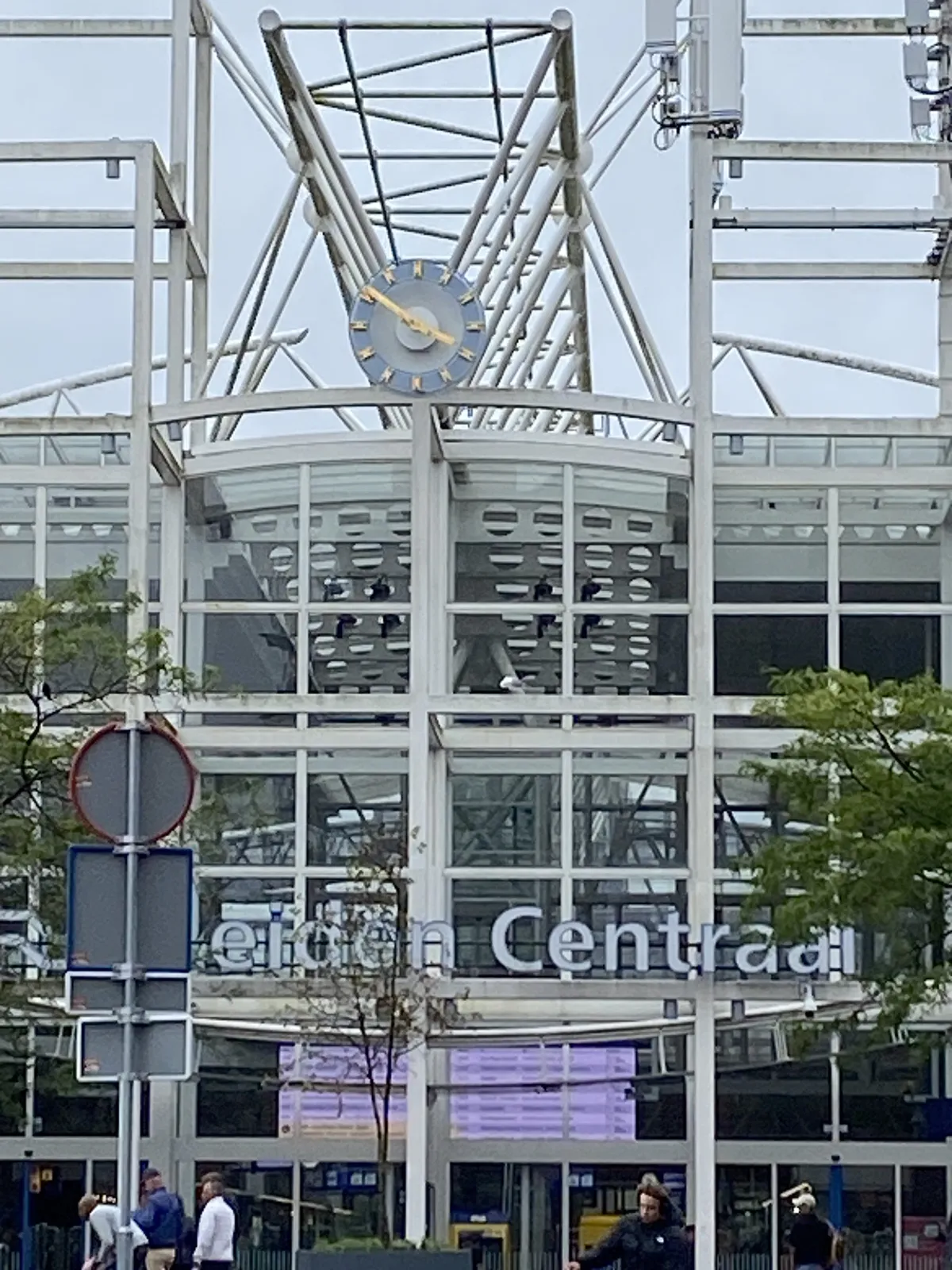 A clock on top of Leiden Central station. It points at 9 minutes to 4.