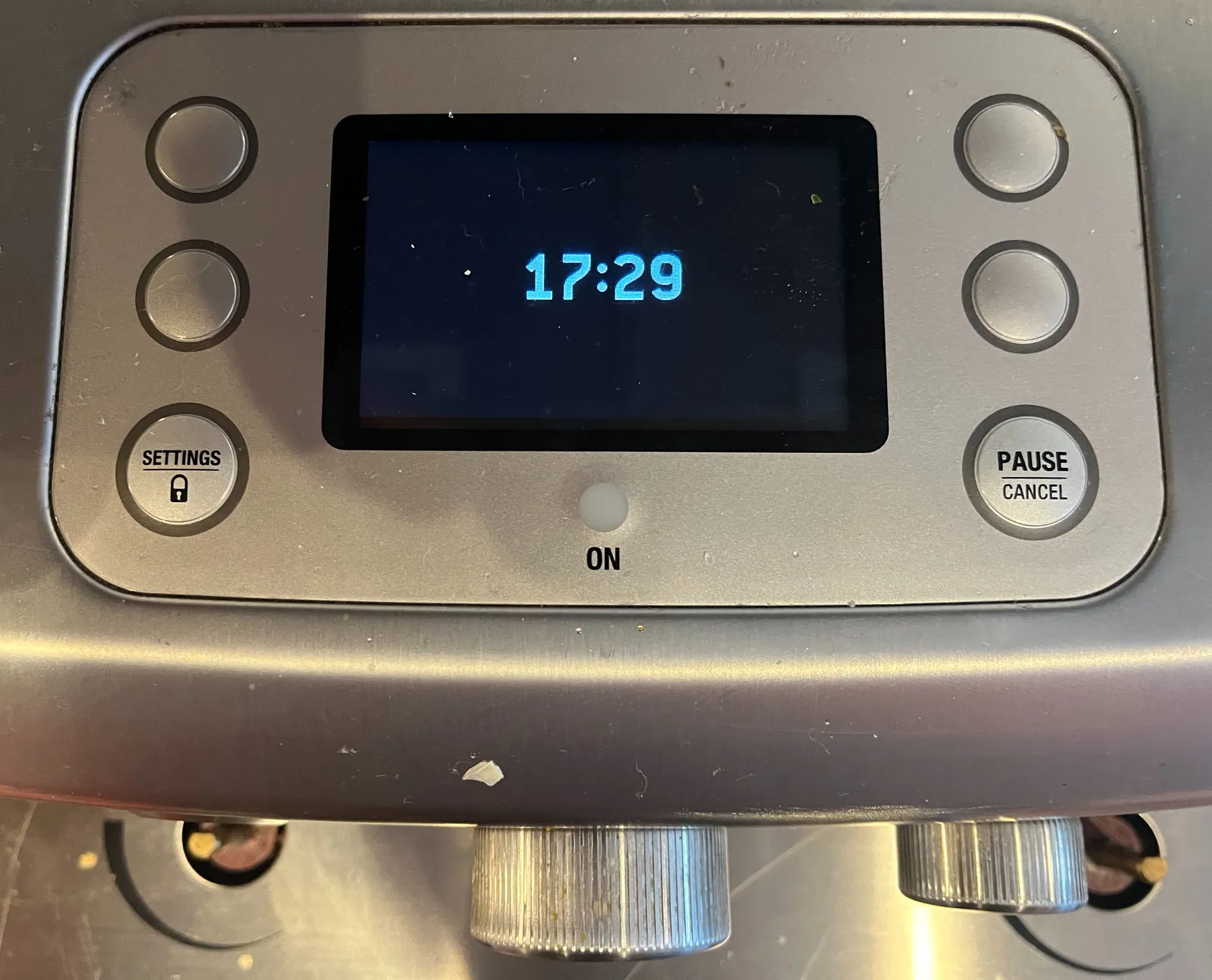 A digital display, surrounded by some buttons and knobs. On the display the time is shown as 17:29