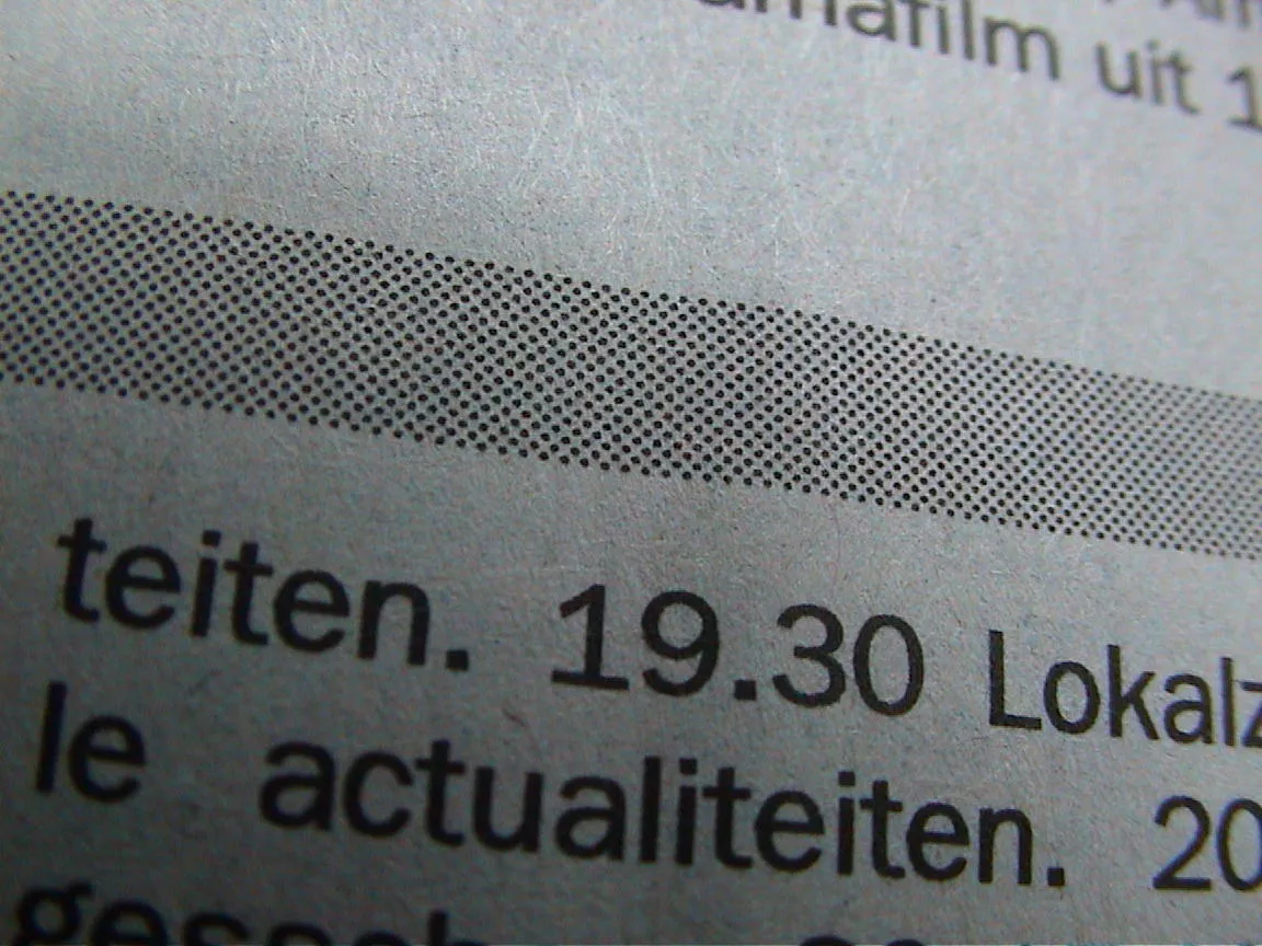 Printed on paper, surrounded by some words, it says 19:30