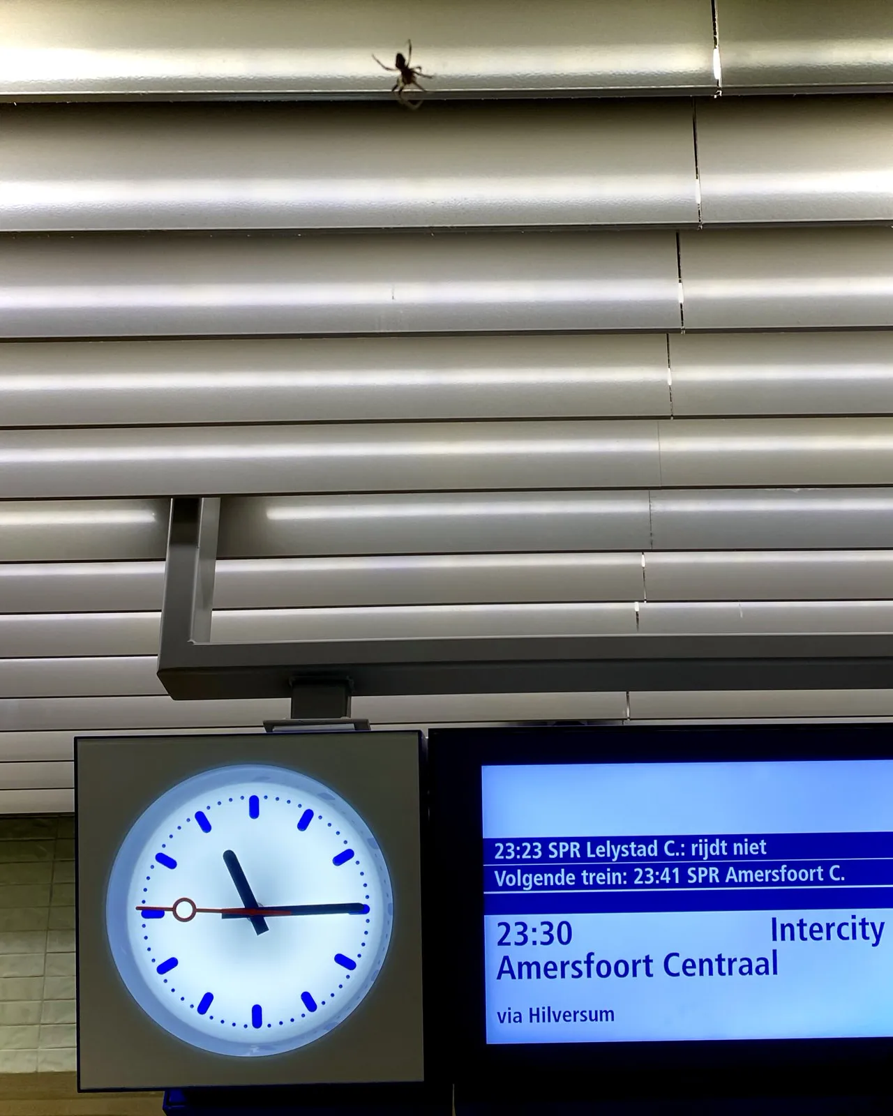 The digital display gives all kinds of contradictory information. The clock next to it points at a quarter past 11.