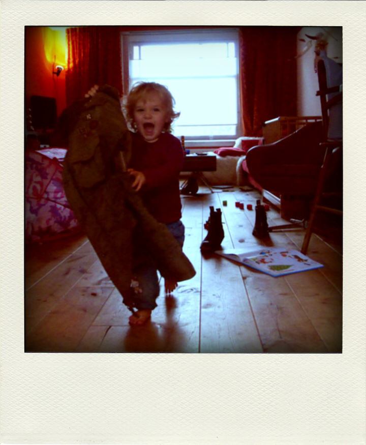 een poladroid van een jas, de grote versie